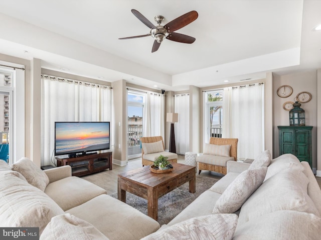 living room featuring ceiling fan