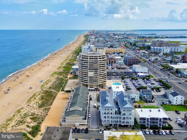 bird's eye view featuring a beach view and a water view