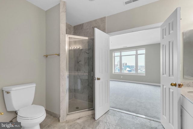 bathroom with an enclosed shower, vanity, tile flooring, and toilet