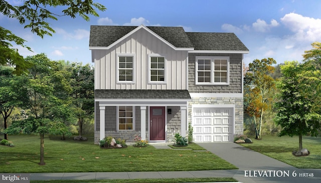 view of front of house with a front lawn and a garage