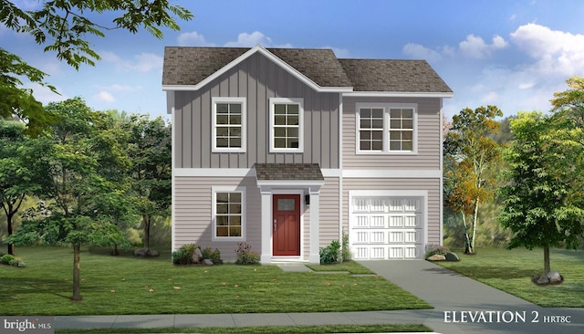 view of front facade with a front yard and a garage