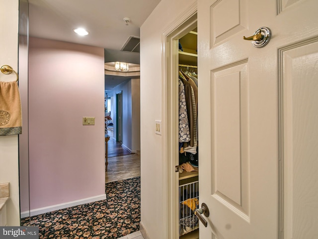 hallway featuring tile floors