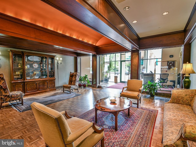 interior space featuring dark parquet flooring, ornamental molding, and an inviting chandelier