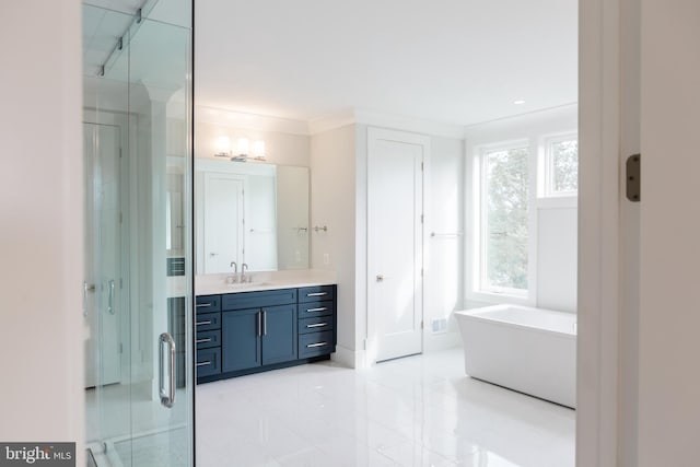 bathroom featuring tile flooring, separate shower and tub, and vanity with extensive cabinet space