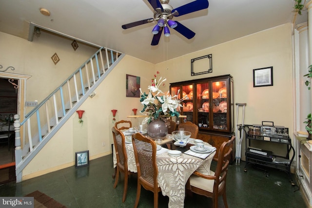 dining space with ceiling fan