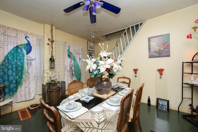 dining room featuring ceiling fan