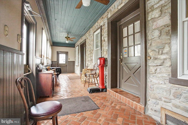 interior space with crown molding