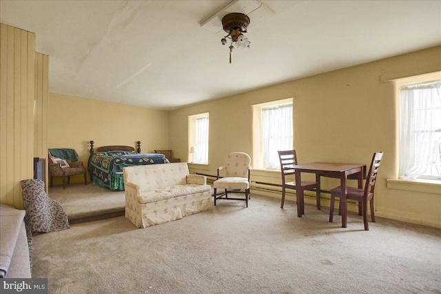 bedroom featuring light colored carpet