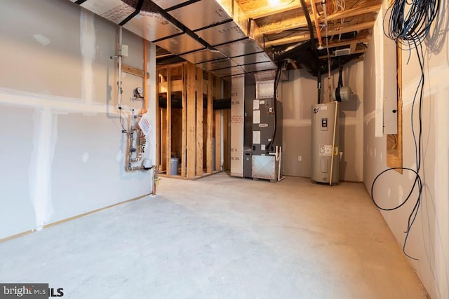 basement with heating utilities and water heater