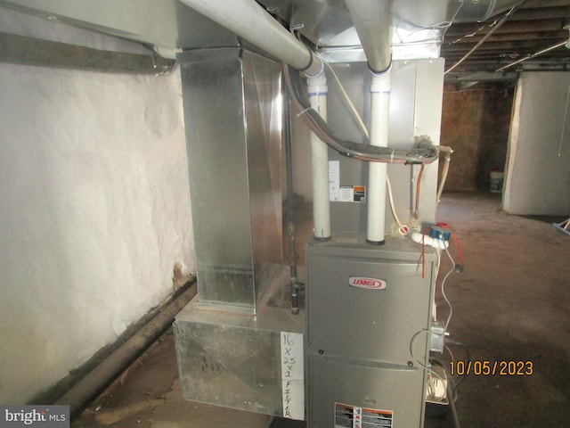 utility room with heating utilities