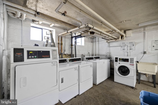 laundry room with washing machine and dryer