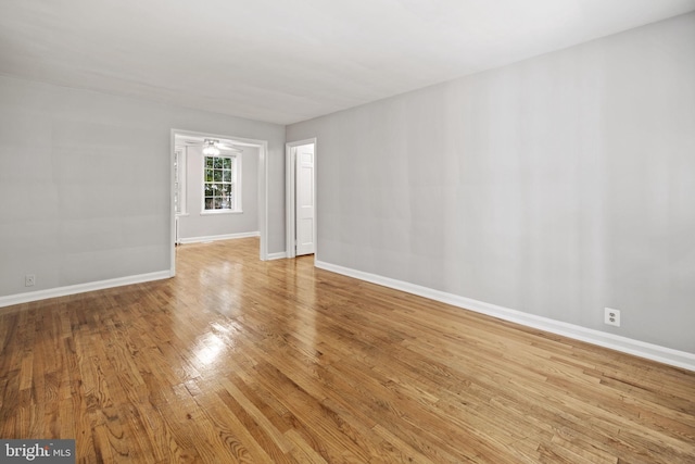 unfurnished room with light hardwood / wood-style floors