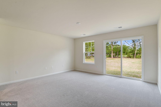 view of carpeted spare room