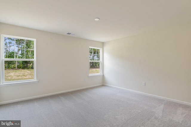 view of carpeted spare room