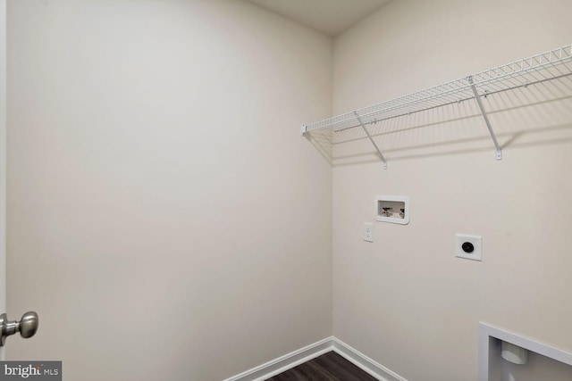 washroom with hardwood / wood-style flooring, washer hookup, and electric dryer hookup