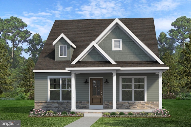 view of front facade featuring stone siding, a front lawn, covered porch, and roof with shingles