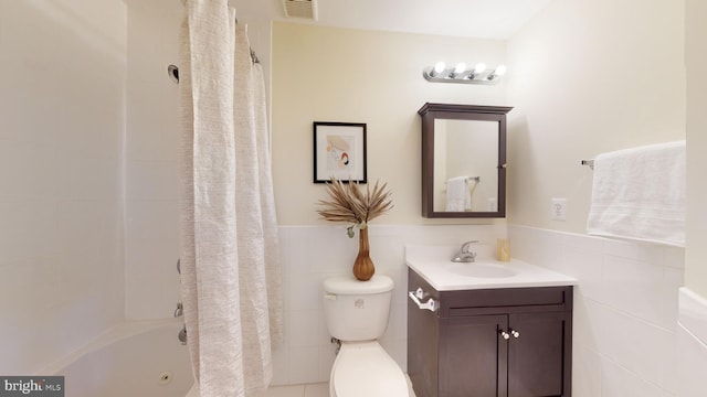 full bathroom with tile walls, shower / bathtub combination with curtain, toilet, and vanity