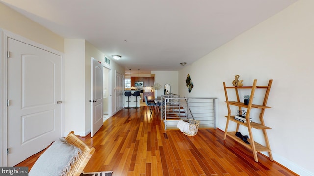 hallway with light wood-type flooring