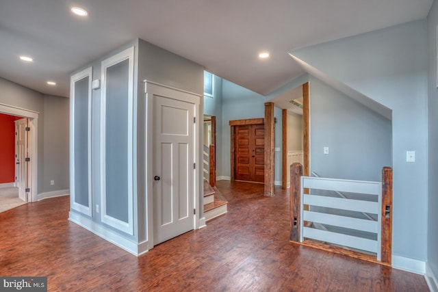 interior space with dark hardwood / wood-style flooring