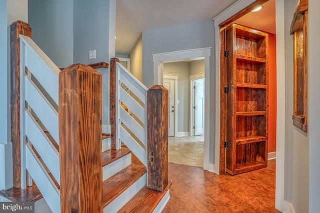 stairway featuring light hardwood / wood-style flooring