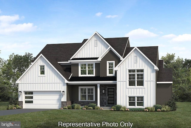 view of front facade featuring a garage and a front yard