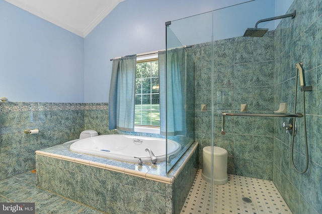 bathroom featuring ornamental molding, tile patterned floors, separate shower and tub, and lofted ceiling