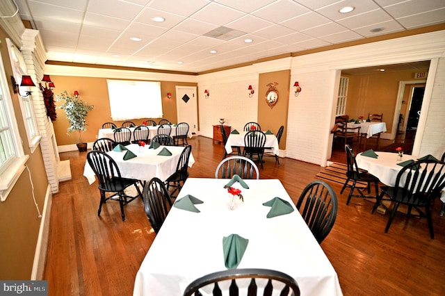 dining space featuring dark hardwood / wood-style floors