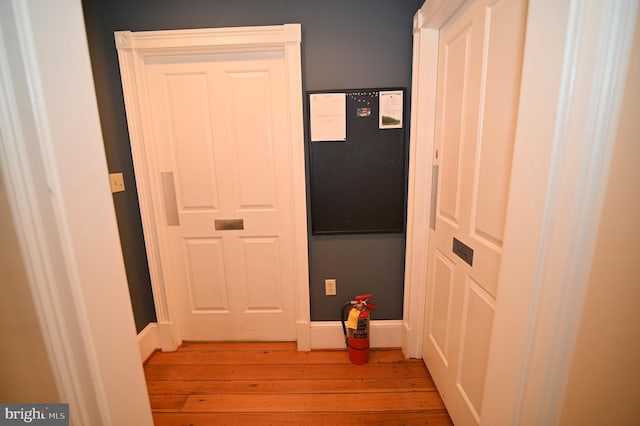 hall featuring light hardwood / wood-style flooring