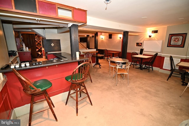 interior space featuring bar area