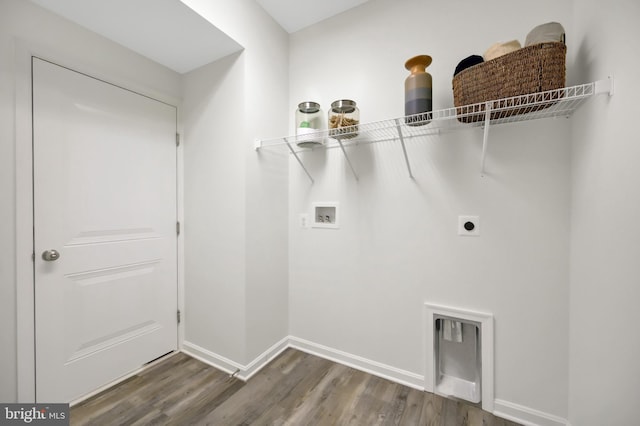 laundry room with washer hookup, dark hardwood / wood-style flooring, and hookup for an electric dryer