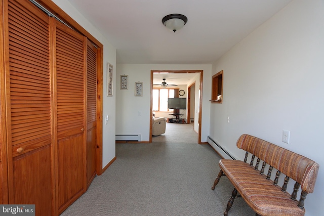 hallway featuring a baseboard heating unit