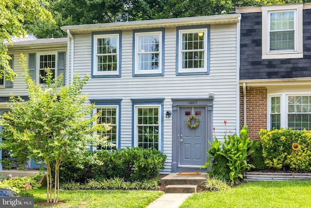 10905 Harpers Square Ct, Reston, VA 20191 - townhome / multi-family property with brick siding and a shingled roof