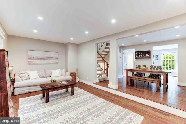 10905 Harpers Square Ct, Reston, VA 20191 - living area with stairway, wood finished floors, and recessed lighting
