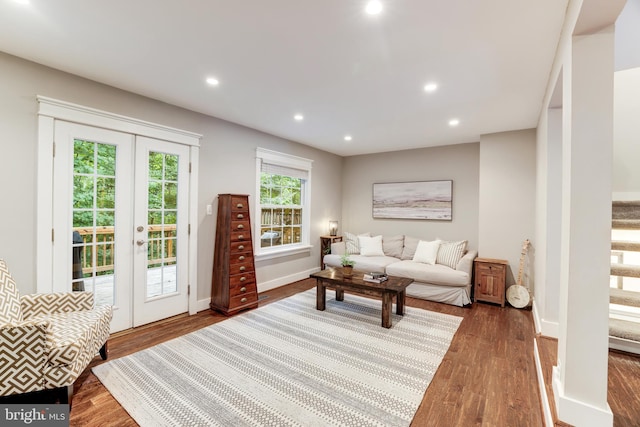 10905 Harpers Square Ct, Reston, VA 20191 - living area with wood finished floors, french doors, recessed lighting, and baseboards