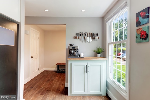 10905 Harpers Square Ct, Reston, VA 20191 - doorway featuring recessed lighting, wood finished floors, and baseboards