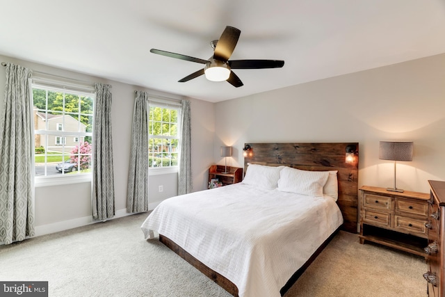 10905 Harpers Square Ct, Reston, VA 20191 - bedroom featuring baseboards, ceiling fan, and carpet flooring