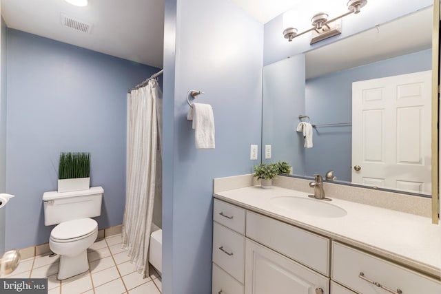 10905 Harpers Square Ct, Reston, VA 20191 - bathroom with a shower with curtain, visible vents, toilet, vanity, and tile patterned flooring