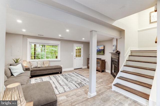 10905 Harpers Square Ct, Reston, VA 20191 - living area with visible vents, stairway, light wood-style floors, and recessed lighting