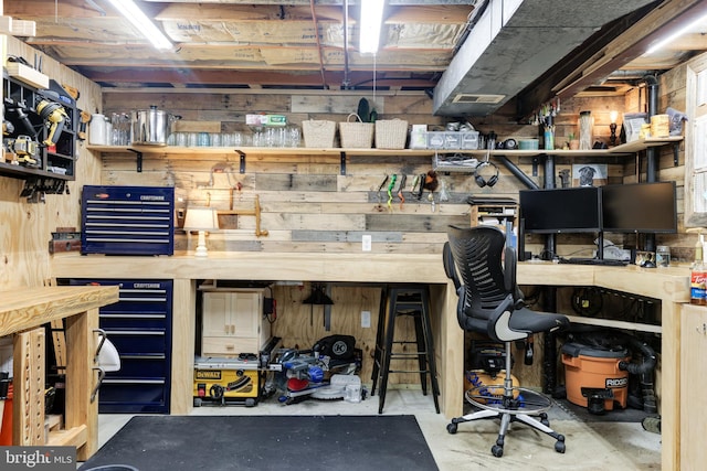 10905 Harpers Square Ct, Reston, VA 20191 - office space featuring a workshop area, wooden walls, and concrete floors