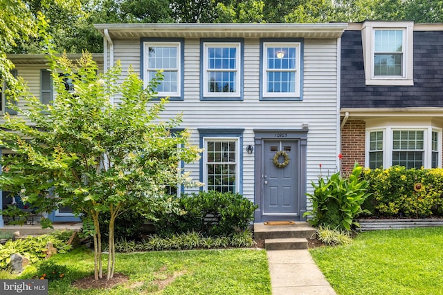10905 Harpers Square Ct, Reston, VA 20191 - view of front of home featuring a front lawn and roof with shingles
