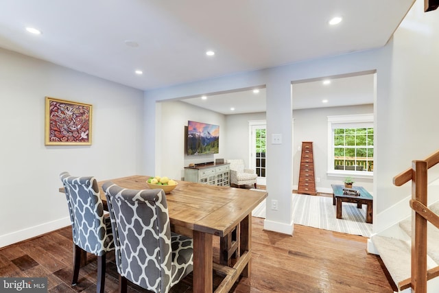 10905 Harpers Square Ct, Reston, VA 20191 - dining space featuring wood finished floors, recessed lighting, baseboards, and stairs