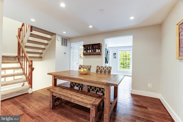10905 Harpers Square Ct, Reston, VA 20191 - dining space featuring recessed lighting, wood finished floors, stairway, baseboards, and visible vents