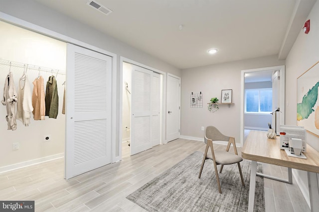 office area featuring light wood-type flooring