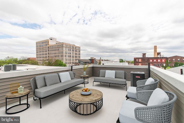 view of terrace with a balcony, an outdoor hangout area, and central air condition unit