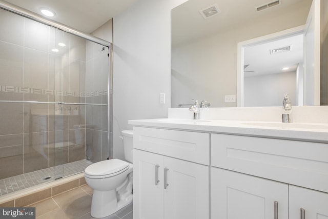 bathroom with walk in shower, tile flooring, oversized vanity, and toilet