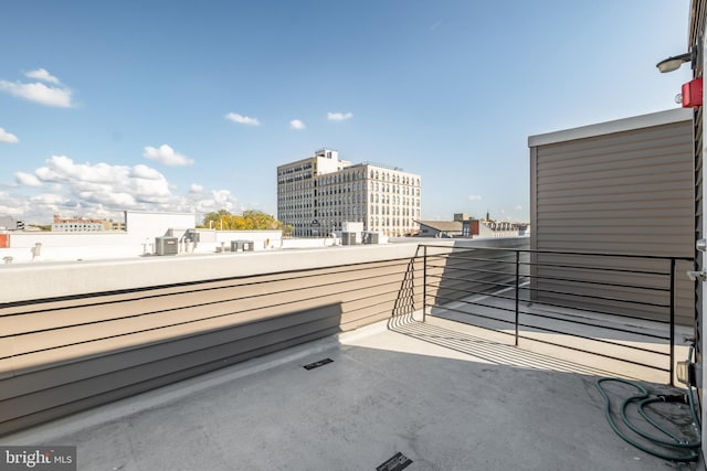 view of patio featuring a balcony