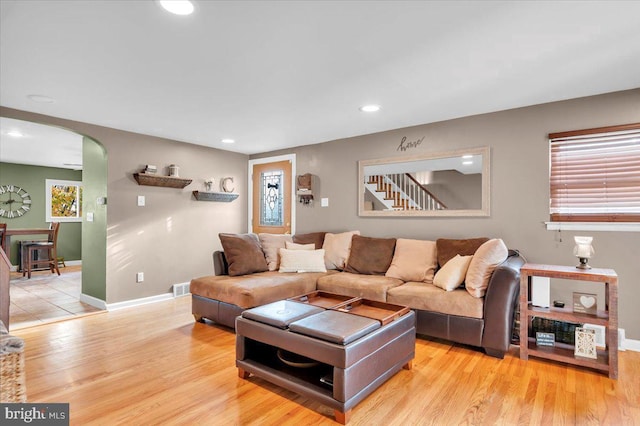 living room with light hardwood / wood-style floors