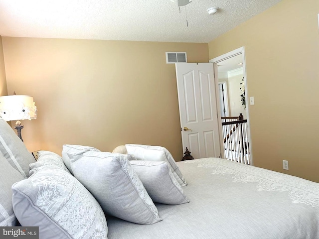 bedroom with a textured ceiling