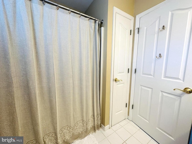 bathroom with tile floors