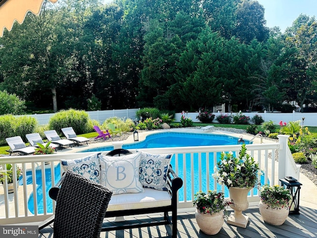 view of swimming pool featuring a patio